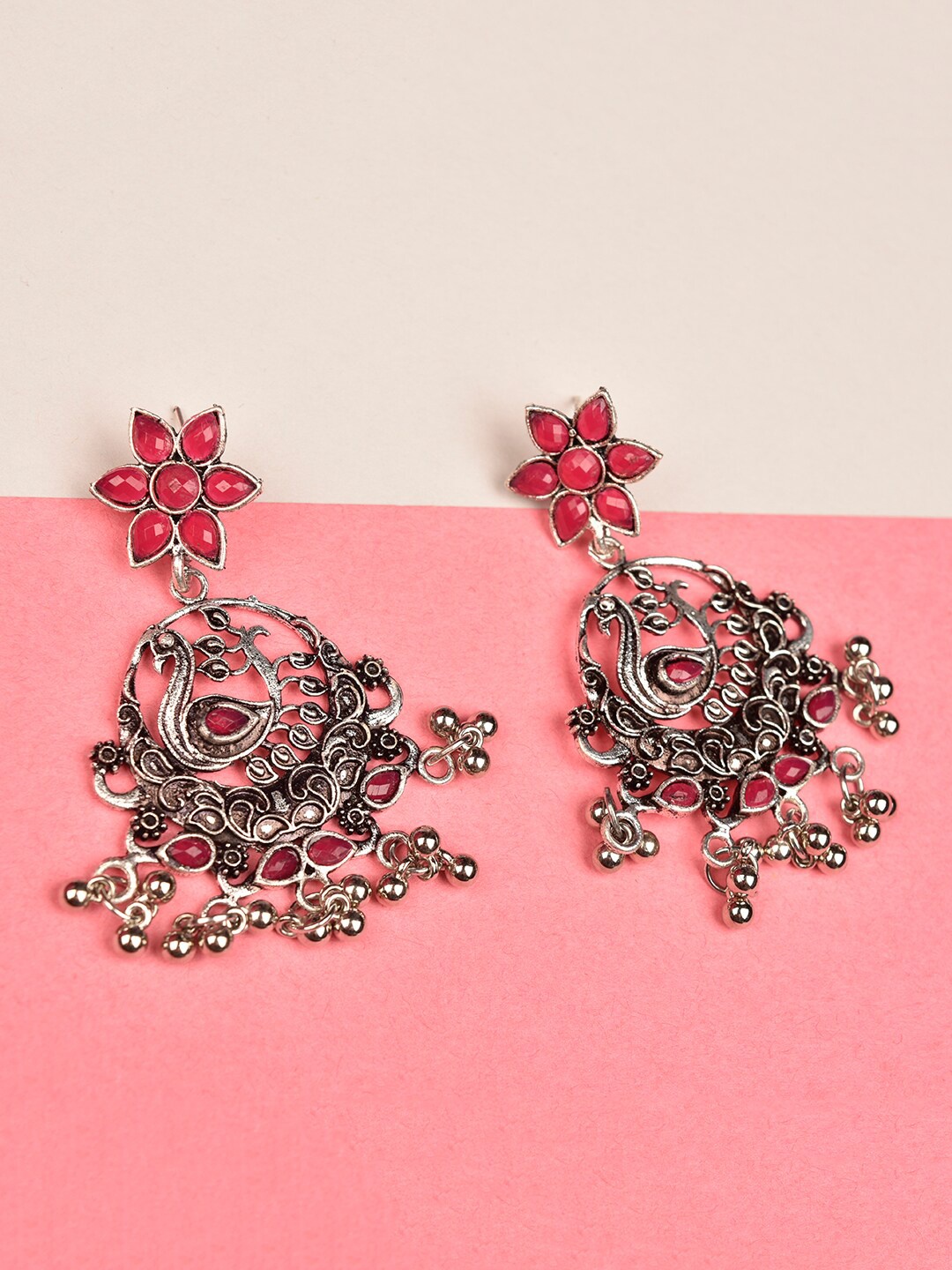 

Indi INSIDE Silver Plated & Pink Oxidised Peacock Shaped Drop Earrings