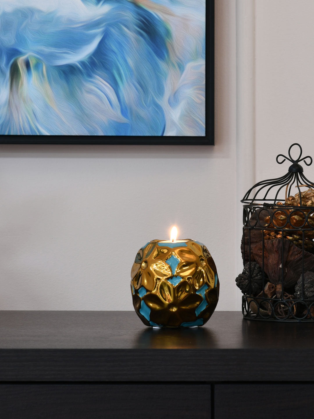 

Athome by Nilkamal Gold-Toned & Turquoise Blue Floral Round Candle Holder