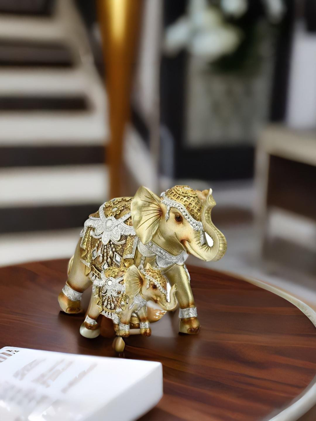 

Athome by Nilkamal Gold-Toned Mother Son Elephant Showpiece