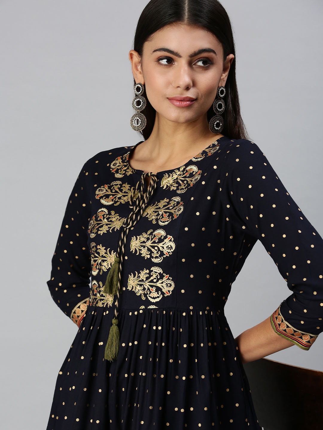 

SHOWOFF Navy Blue & Gold-Toned Ethnic Motifs Printed Pleated Kurti
