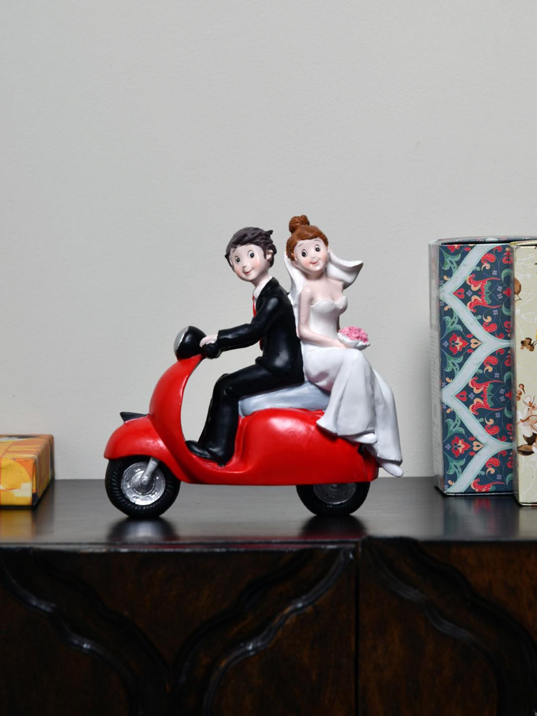 

Athome by Nilkamal Black & White Couple On Scooter Showpiece