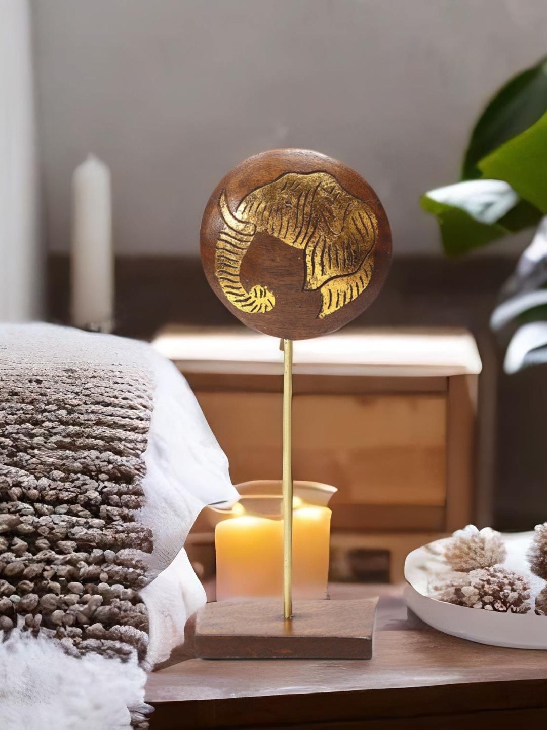 

Athome by Nilkamal Gold-Toned & Brown Textured Elephant Face On Stand Showpiece