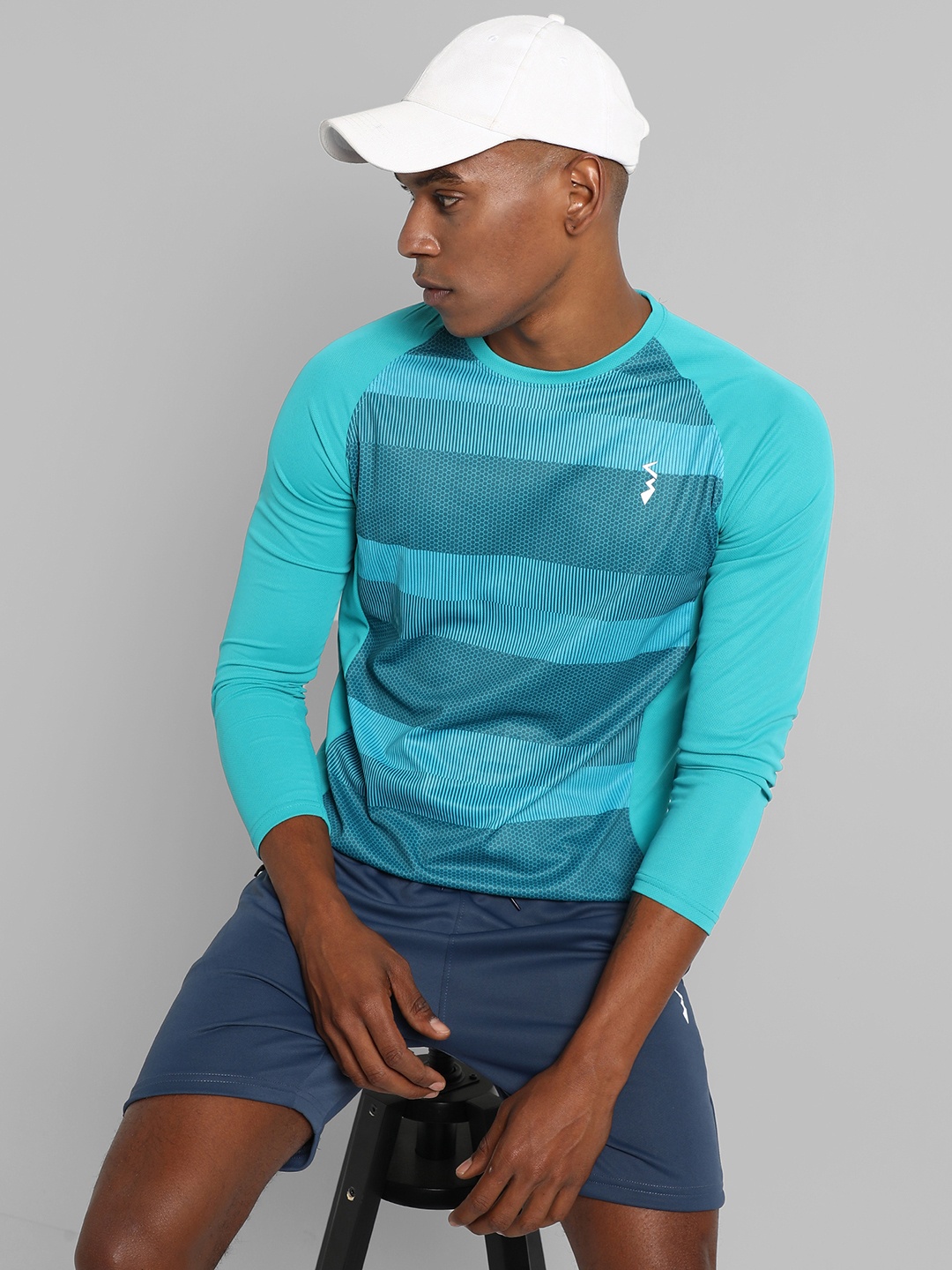 

Campus Sutra Men Blue Printed Outdoor Sports T-shirt