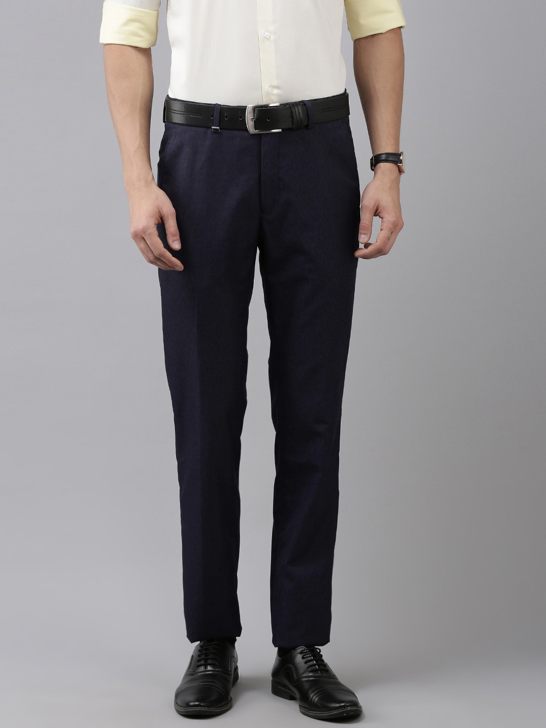 

Van Heusen Men Navy Blue Textured Self Design Slim Fit Mid-Rise Plain Formal Trousers