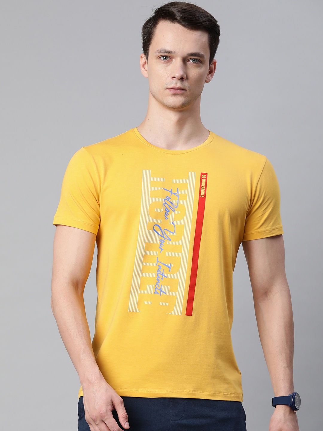 

Pierre Carlo Men Mustard Yellow & Blue Typography Printed T-shirt