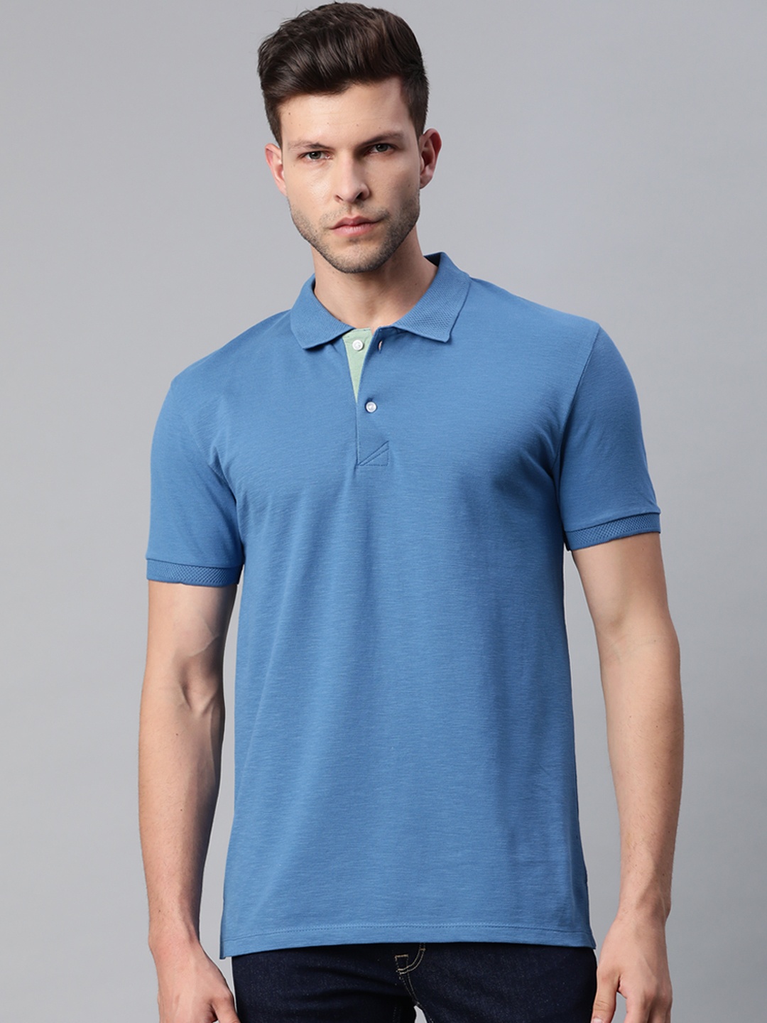 

Pierre Carlo Men Blue Solid Polo Collar T-shirt