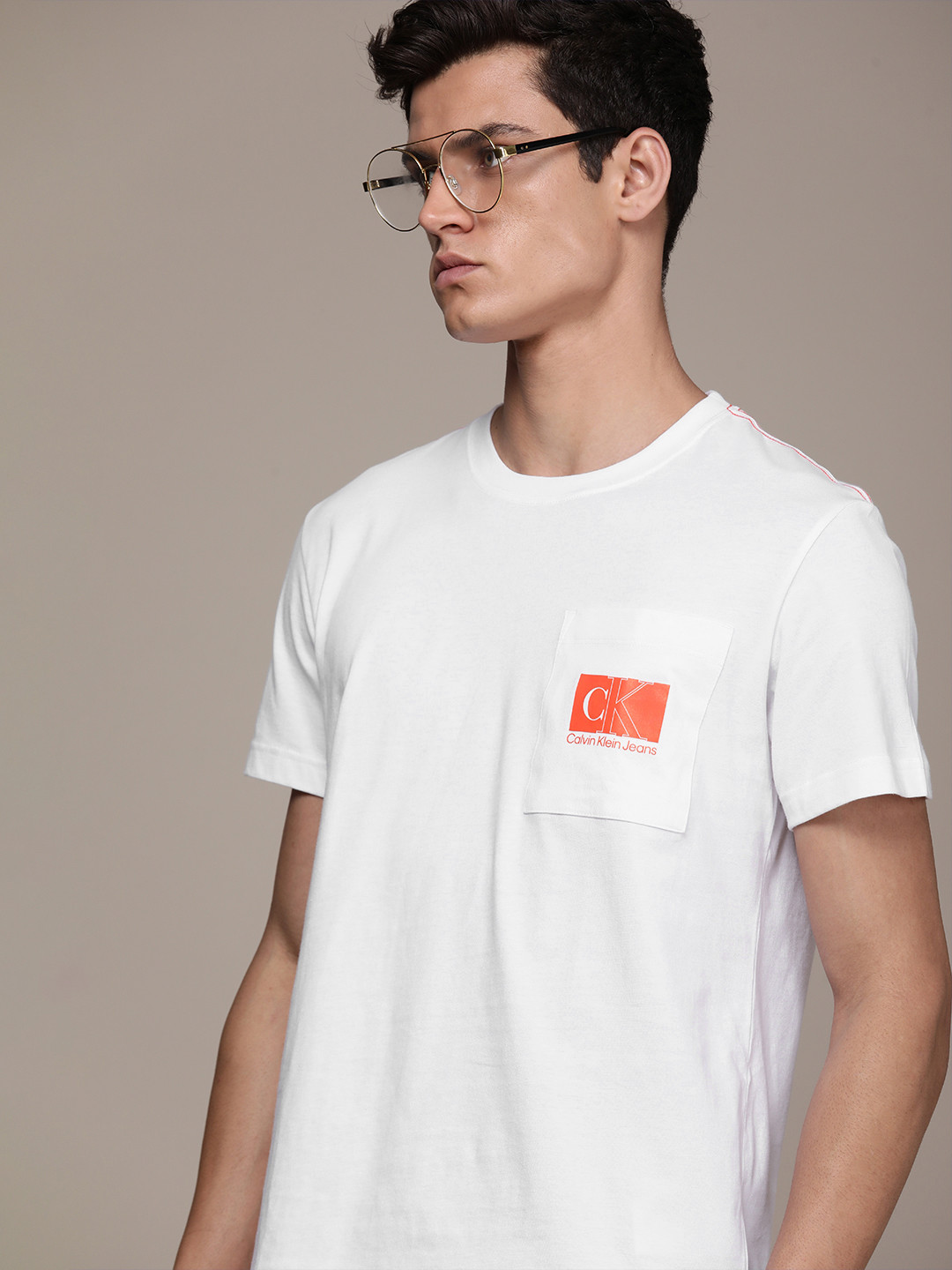 

Calvin Klein Jeans Men White & Orange Printed T-shirt
