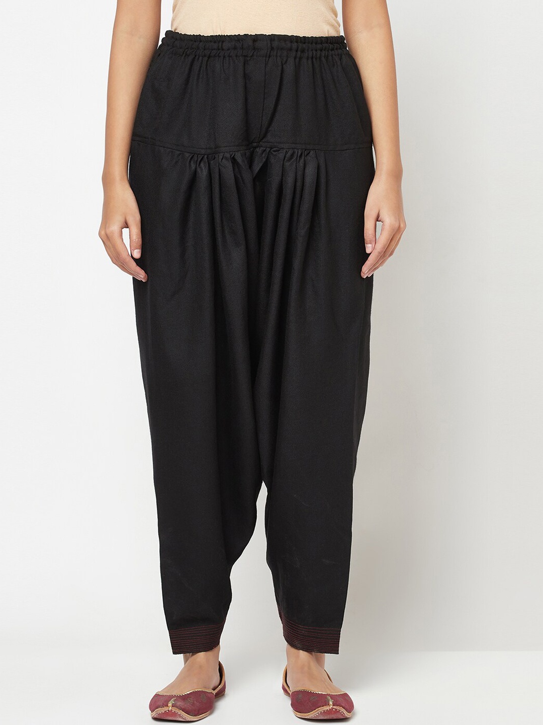 

Fabindia Women Black Solid Slim Fit Wool Salwar