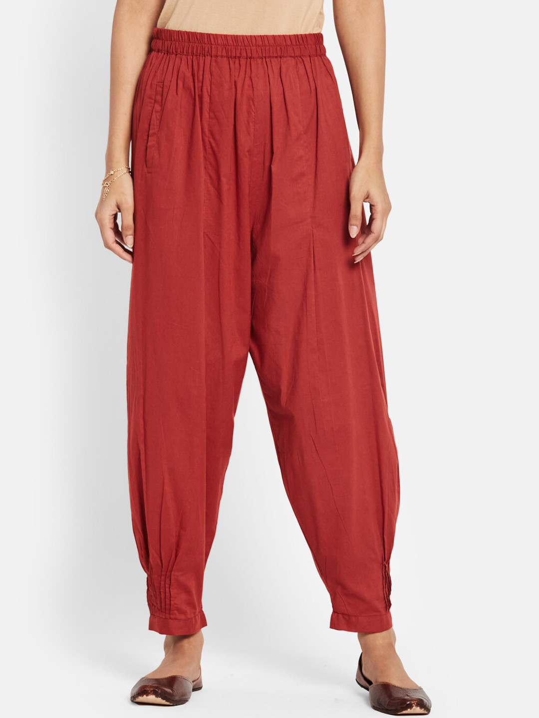 

Fabindia Women Rust Brown Solid Cotton Slim-Fit Salwar