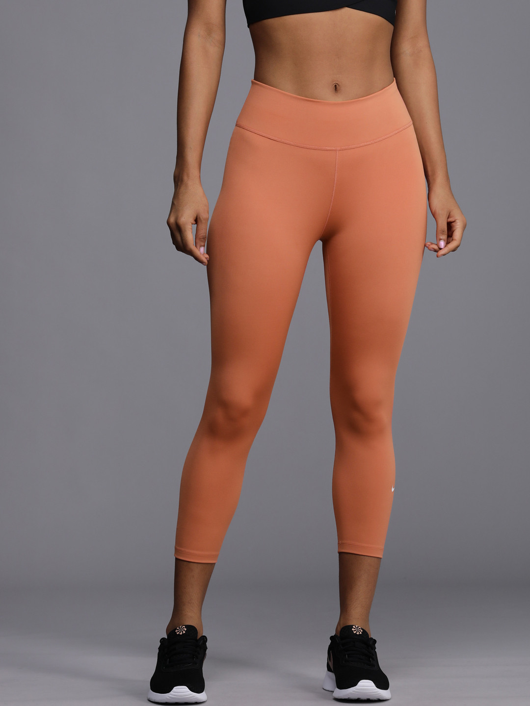 

Nike Women Orange Mid-Rise Capris