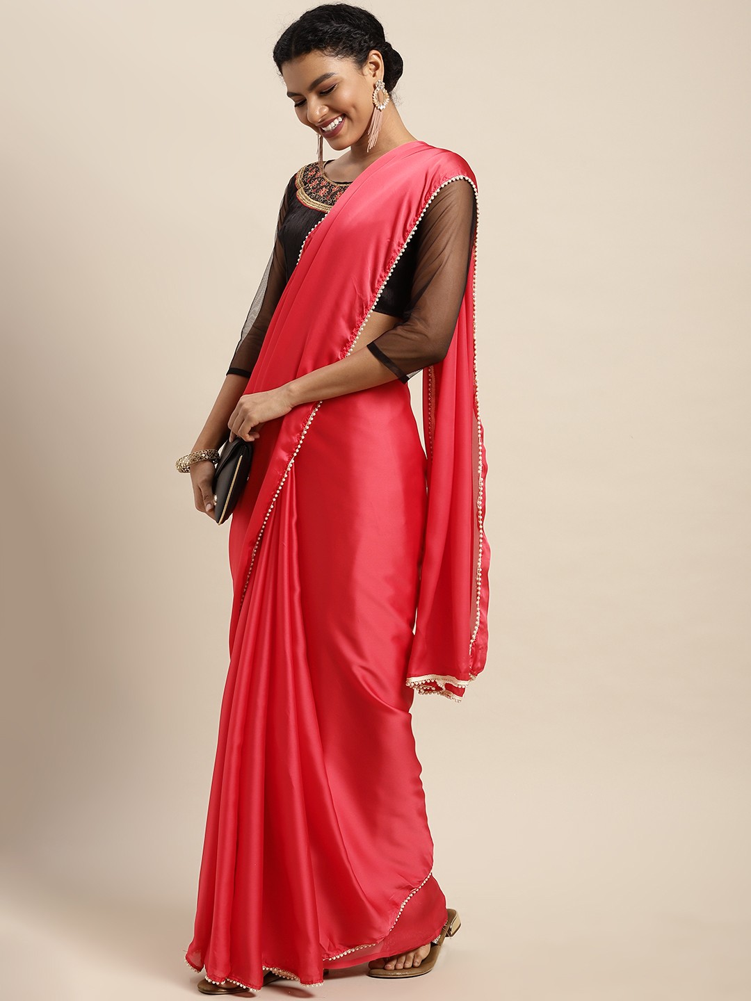 

Mitera Coral Red Solid Satin Saree