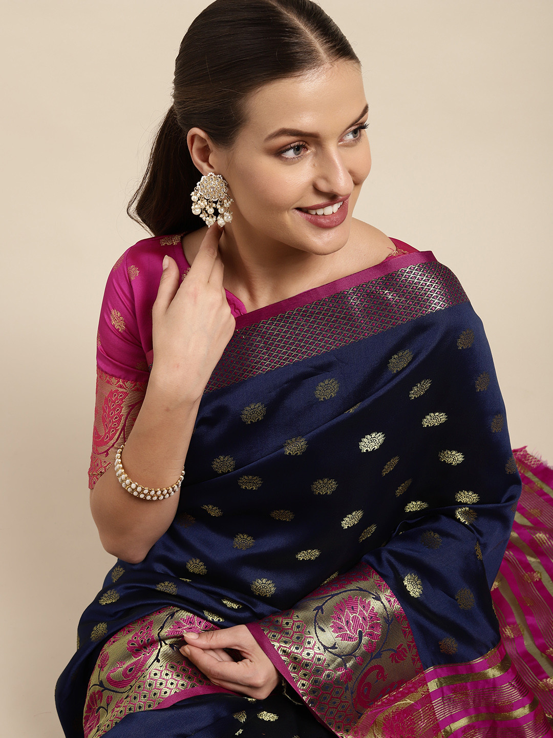 

Mitera Navy Blue & Golden Ethnic Motifs Zari Silk Blend Kanjeevaram Saree