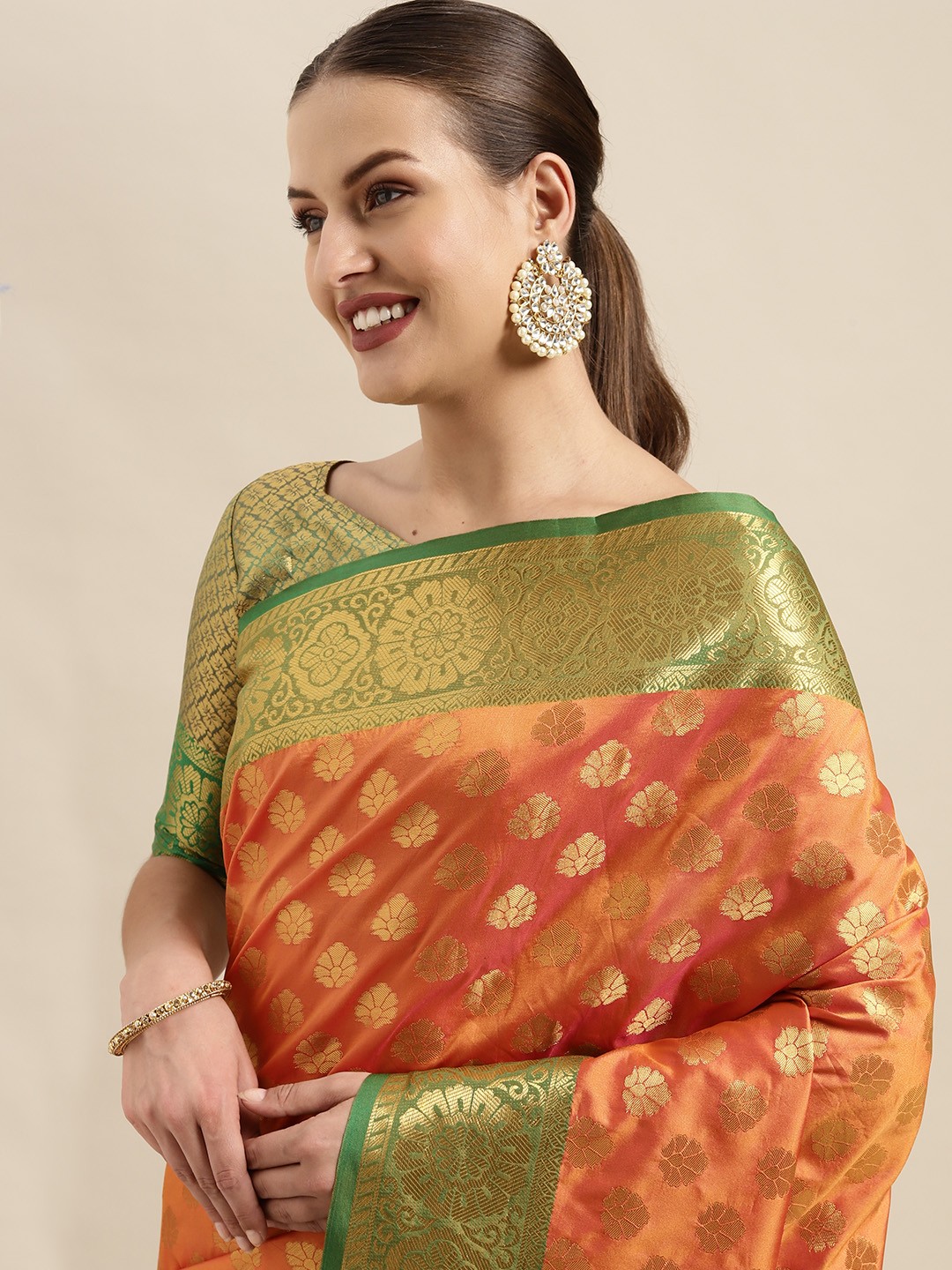 

Mitera Orange & Gold-Toned Ethnic Motifs Zari Silk Blend Kanjeevaram Saree