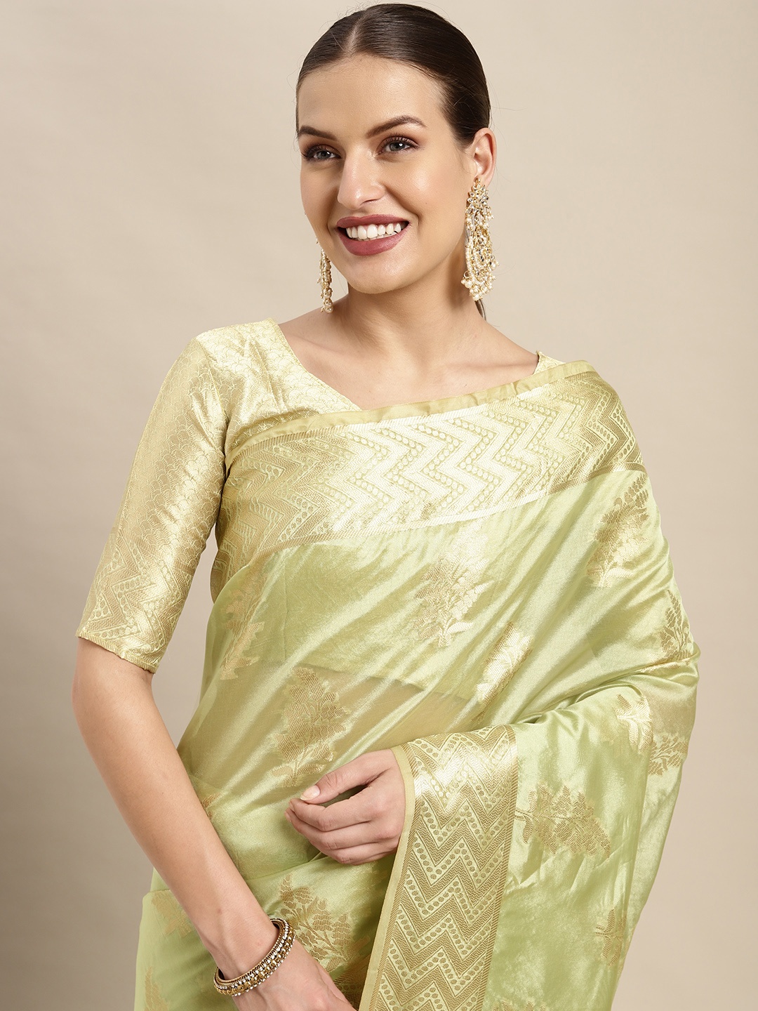 

Mitera Green & Golden Ethnic Motifs Zari Organza Kanjeevaram Saree