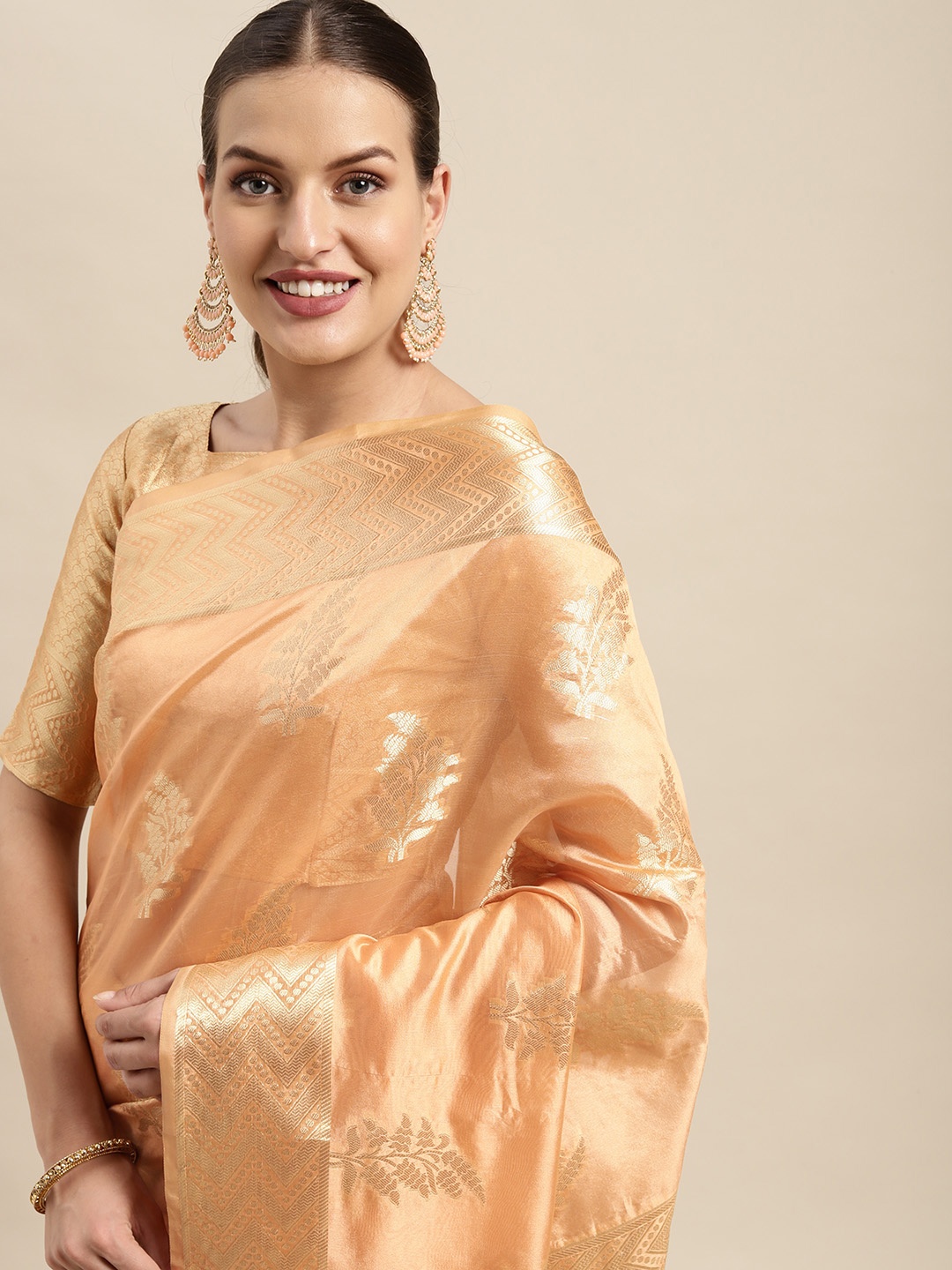 

Mitera Orange & Golden Ethnic Motifs Zari Organza Kanjeevaram Saree