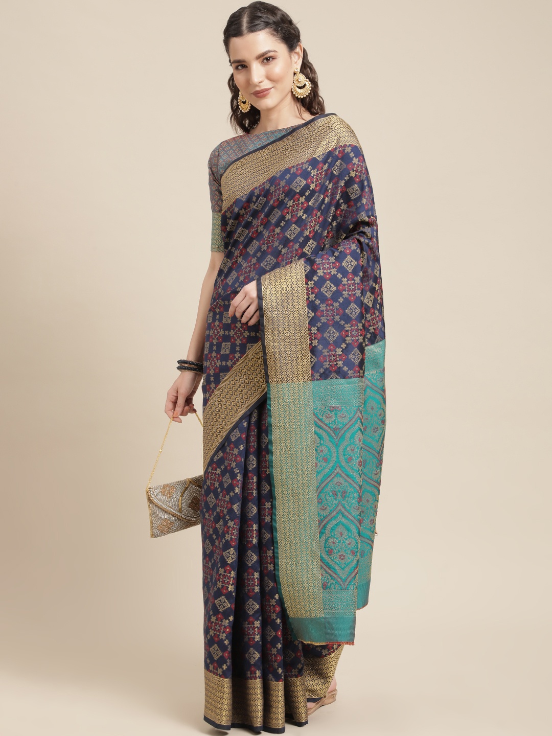 

Mitera Navy Blue & Golden Ethnic Motifs Zari Silk Blend Patola Saree