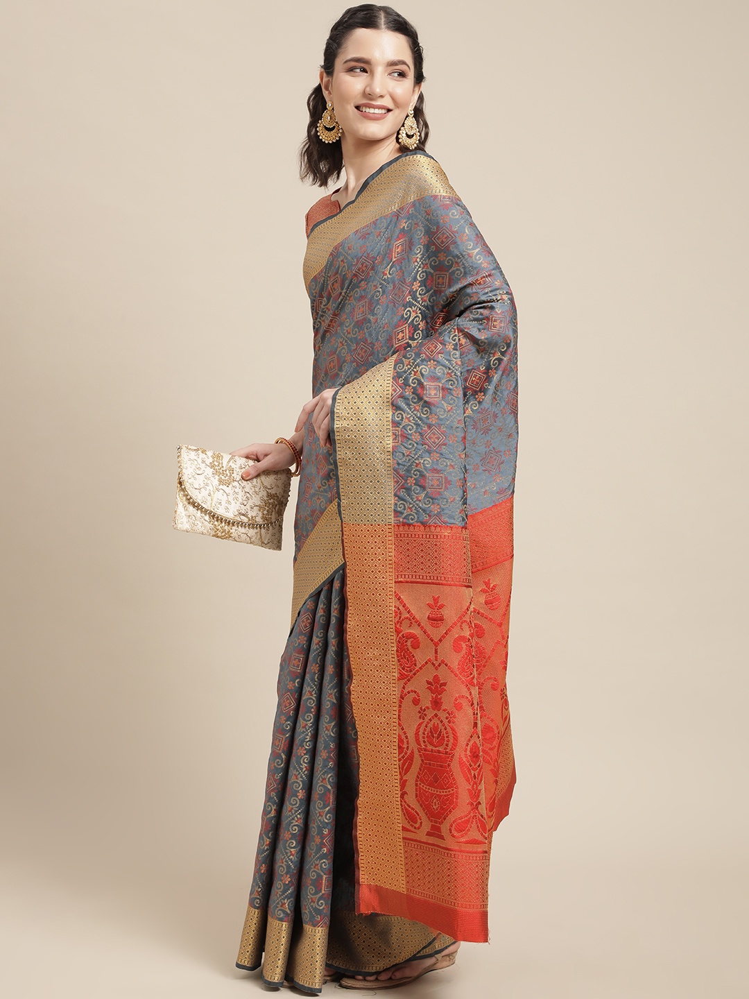 

Mitera Charcoal Grey & Red Ethnic Motifs Zari Silk Blend Patola Saree