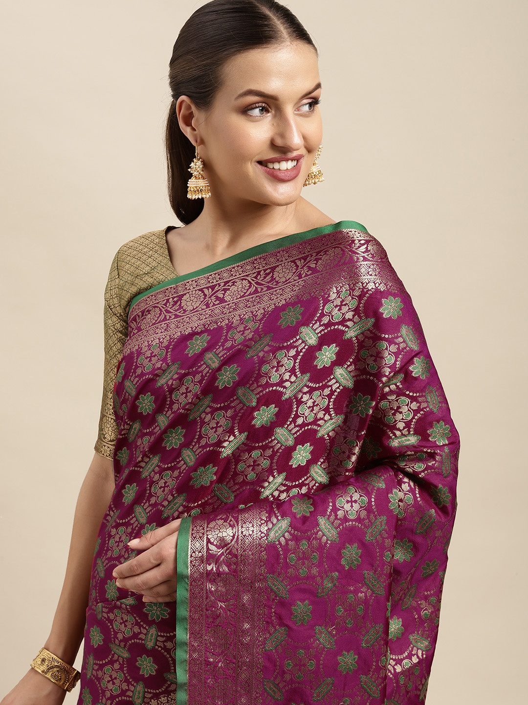 

Mitera Burgundy & Golden Ethnic Motifs Zari Silk Blend Kanjeevaram Saree