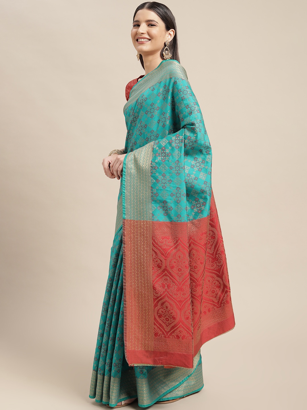 

Mitera Blue & Red Ethnic Motifs Zari Silk Blend Patola Saree