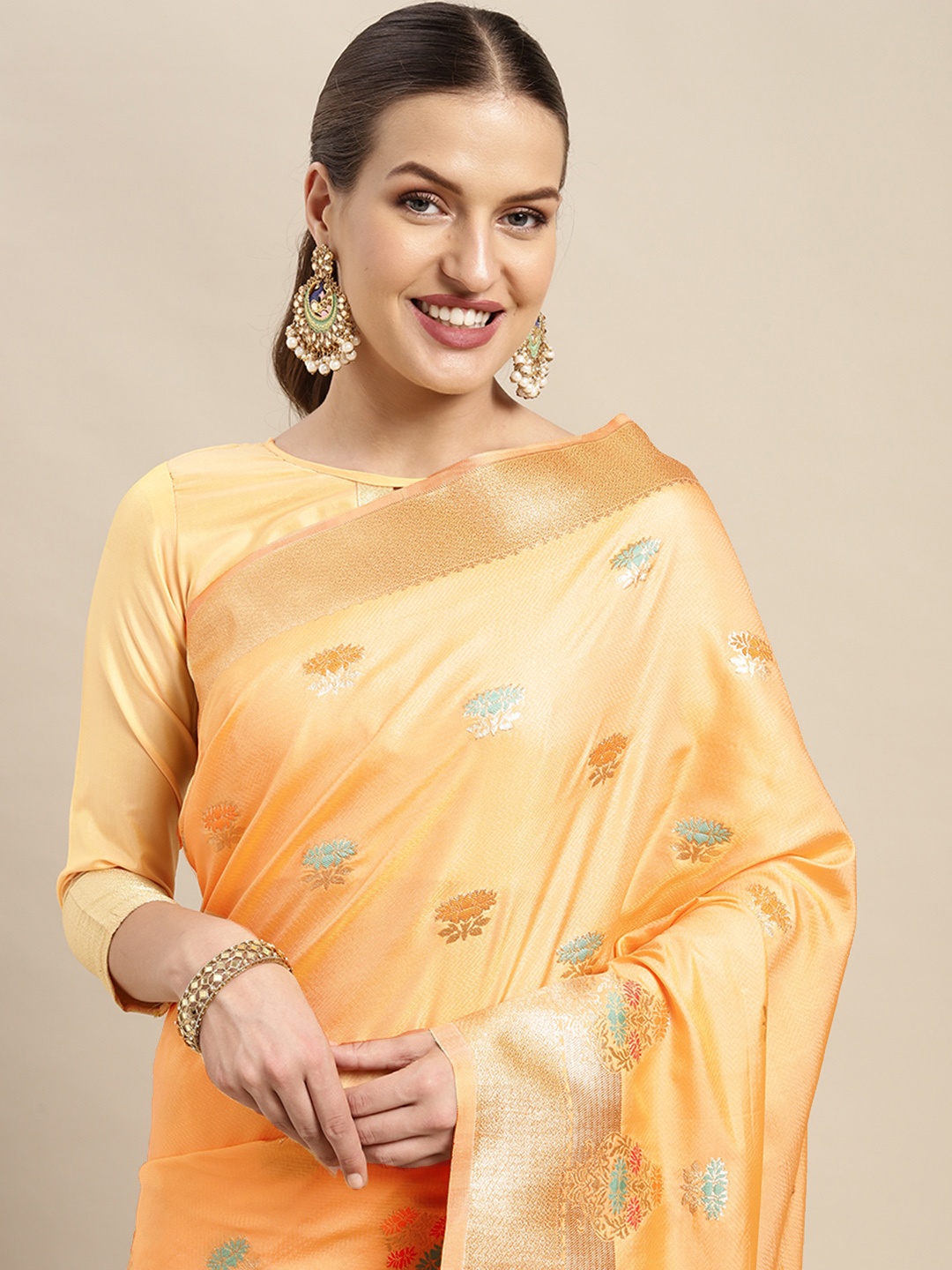 

Mitera Orange & Gold Floral Woven Design Silk Blend Kanjeevaram Saree