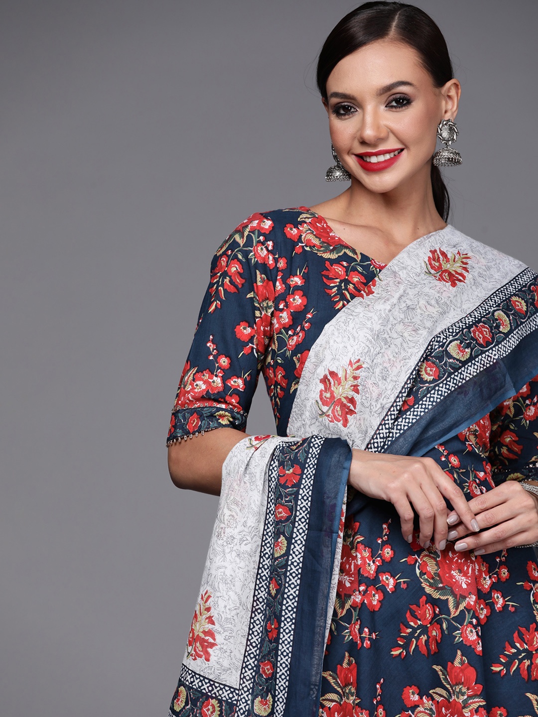 

Indo Era Women Navy Blue & Re Floral Printed Kurta with Palazzos & With Dupatta
