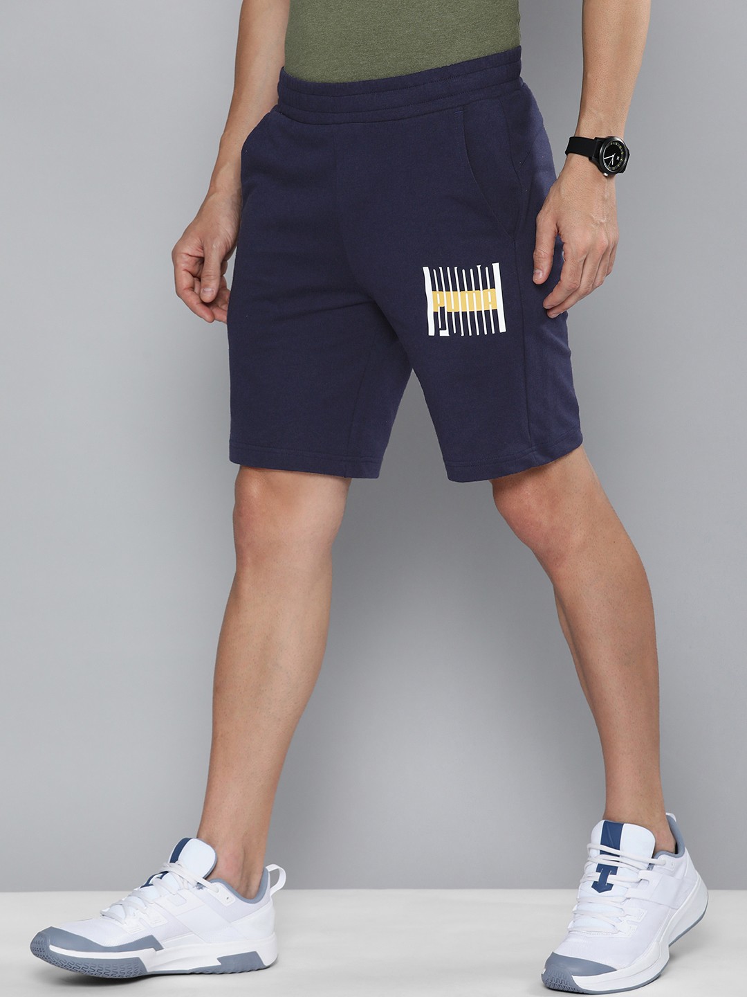 

Puma Men Navy Blue Brand Logo Printed Slim Fit Sports Shorts