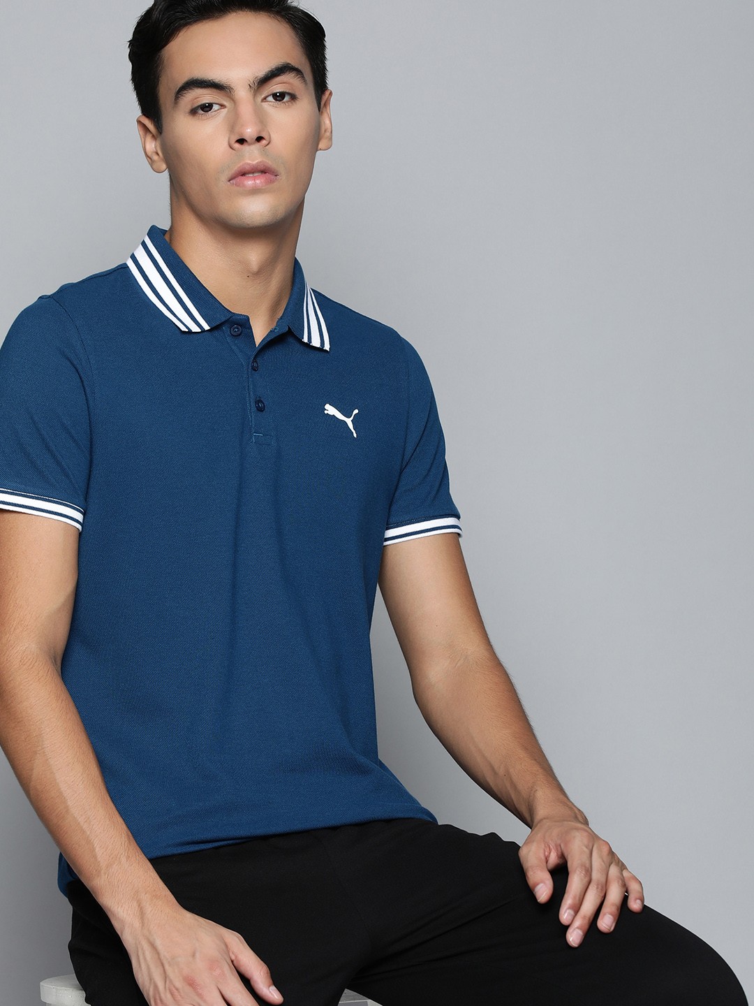 

one8 x PUMA Men Blue & White Printed Polo Collar Casual T-shirt