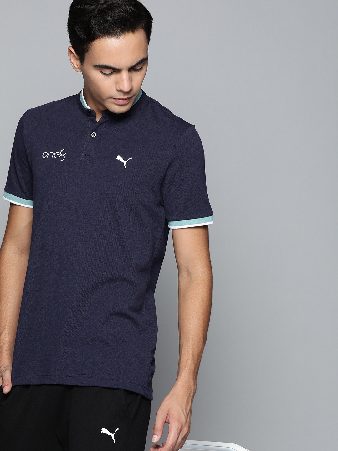 

one8 x PUMA Men Blue & Navy Blue Colourblocked Mandarin Collar Casual T-shirt