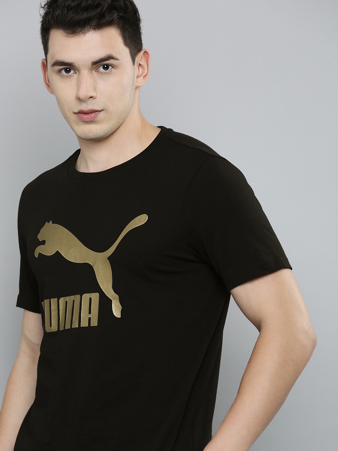 

Puma Men Black & Gold-Toned Brand Logo Printed Pure Cotton T-shirt