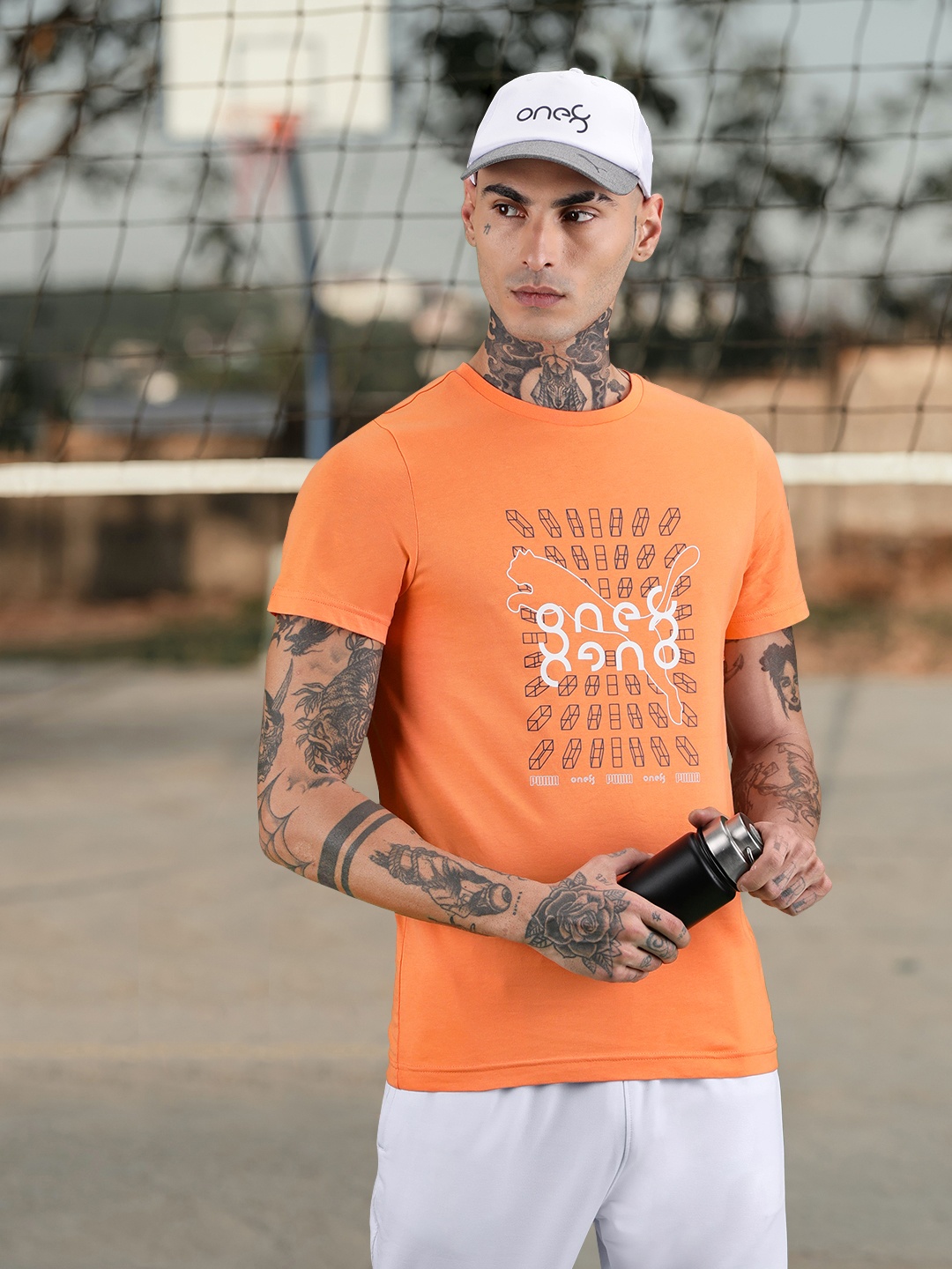 

one8 x PUMA Men Orange Brand Logo Printed Pure Cotton T-shirt