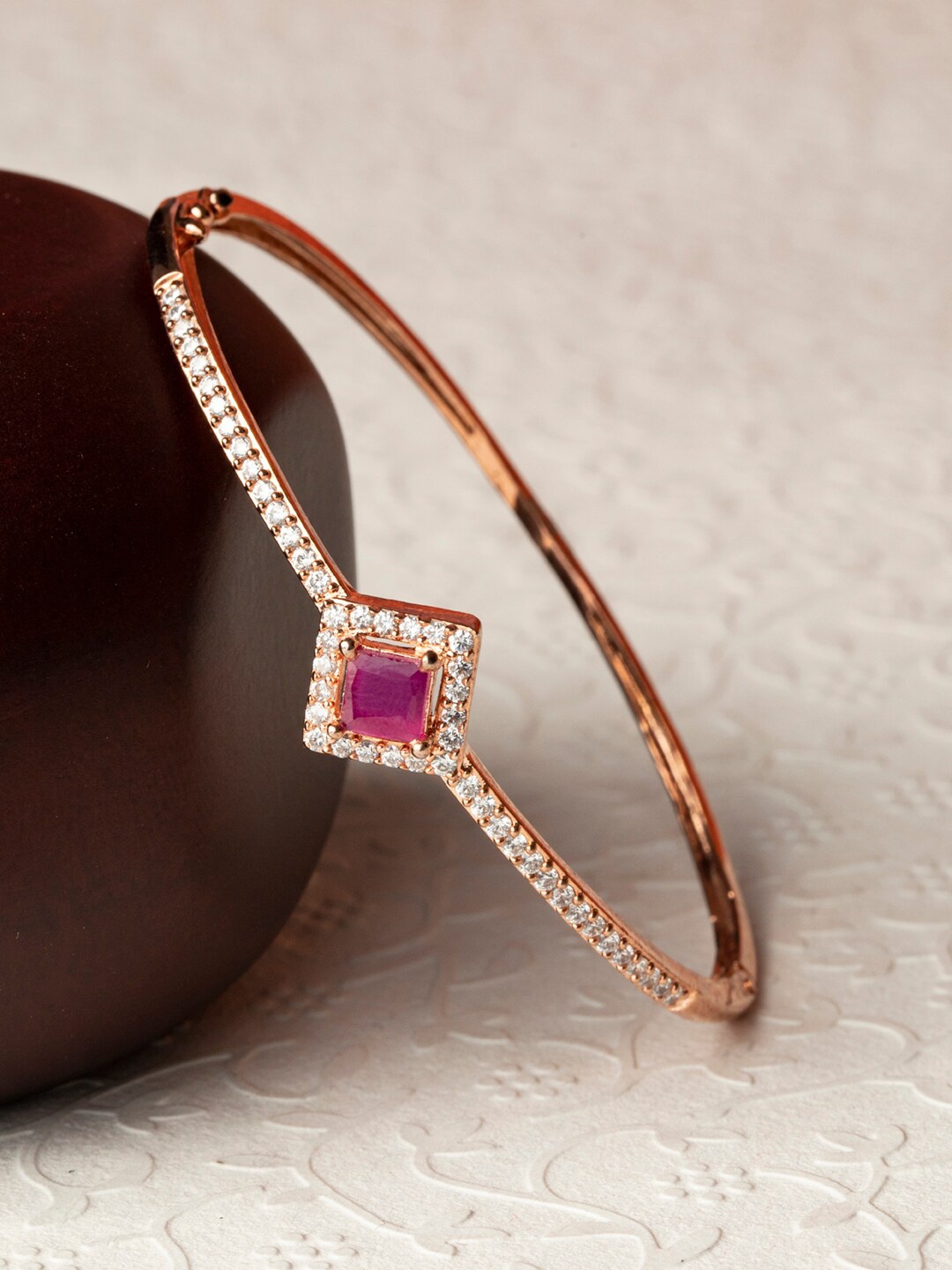 

Priyaasi Women Pink Square Stone Brass American Diamond Rose Gold-Plated Bracelet