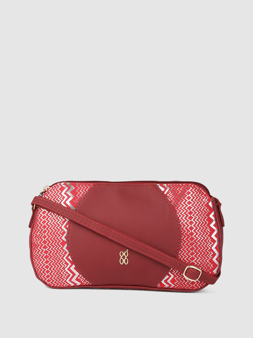 

Baggit Red Chevron Printed Structured Sling Bag