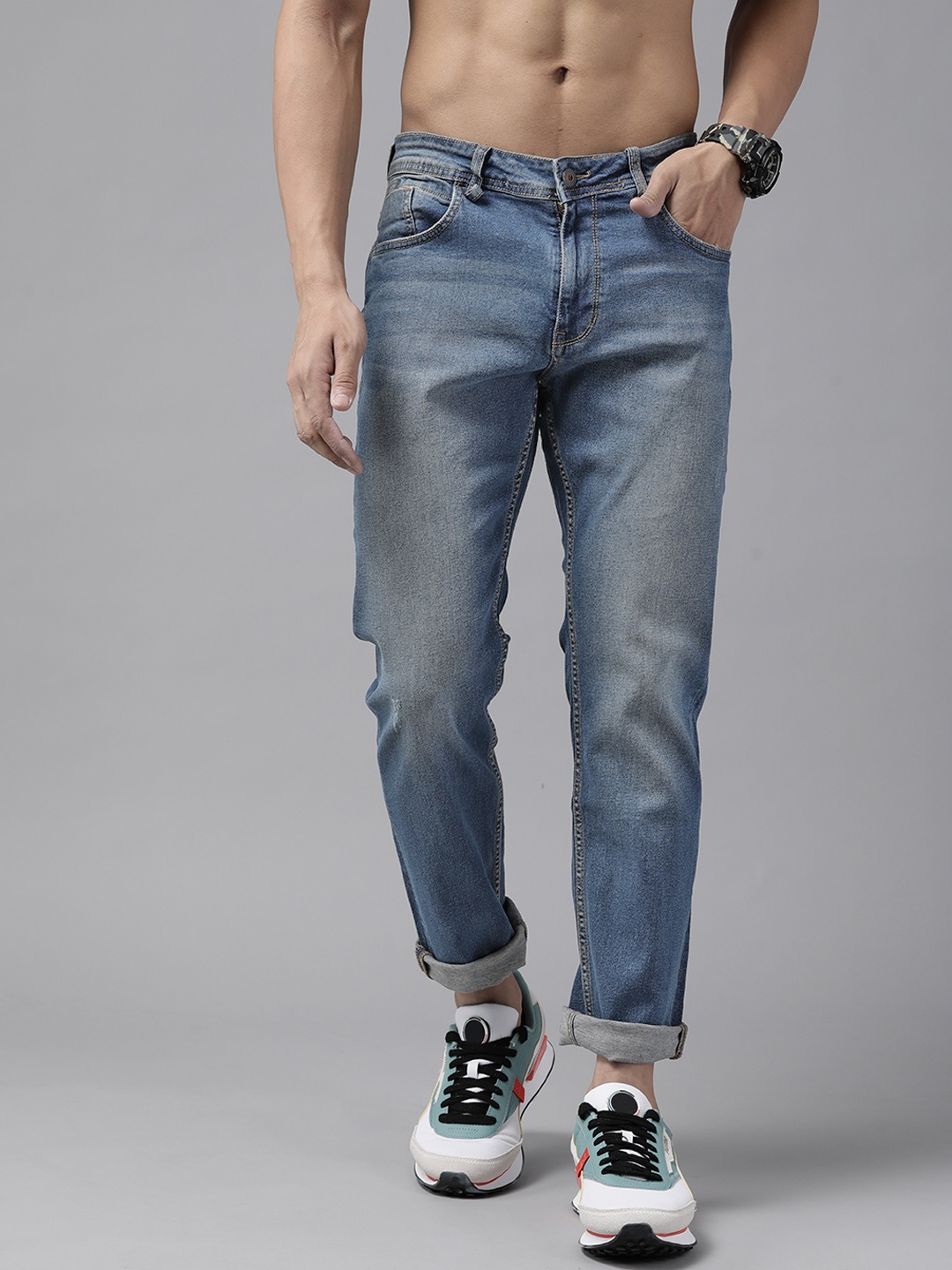 

Roadster Men Navy Blue Slim Fit Low Distress Light Fade Stretchable Jeans