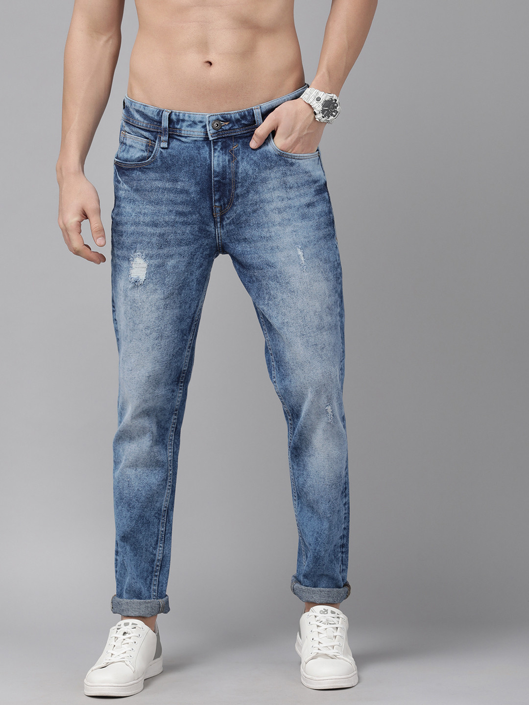 

The Roadster Lifestyle Co Men Blue Slim Fit Low Distress Heavy Fade Stretchable Jeans