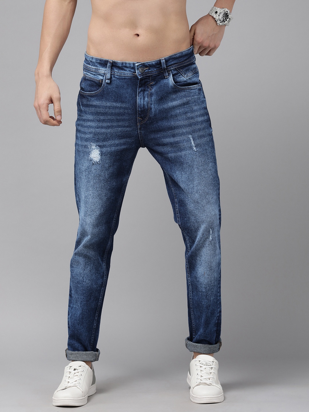 

The Roadster Lifestyle Co Men Blue Slim Fit Light Fade Stretchable Jeans