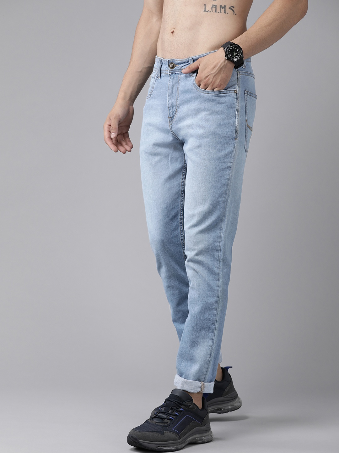 

Roadster Men Blue Solid Tapered Fit Light Fade Stretchable Jeans