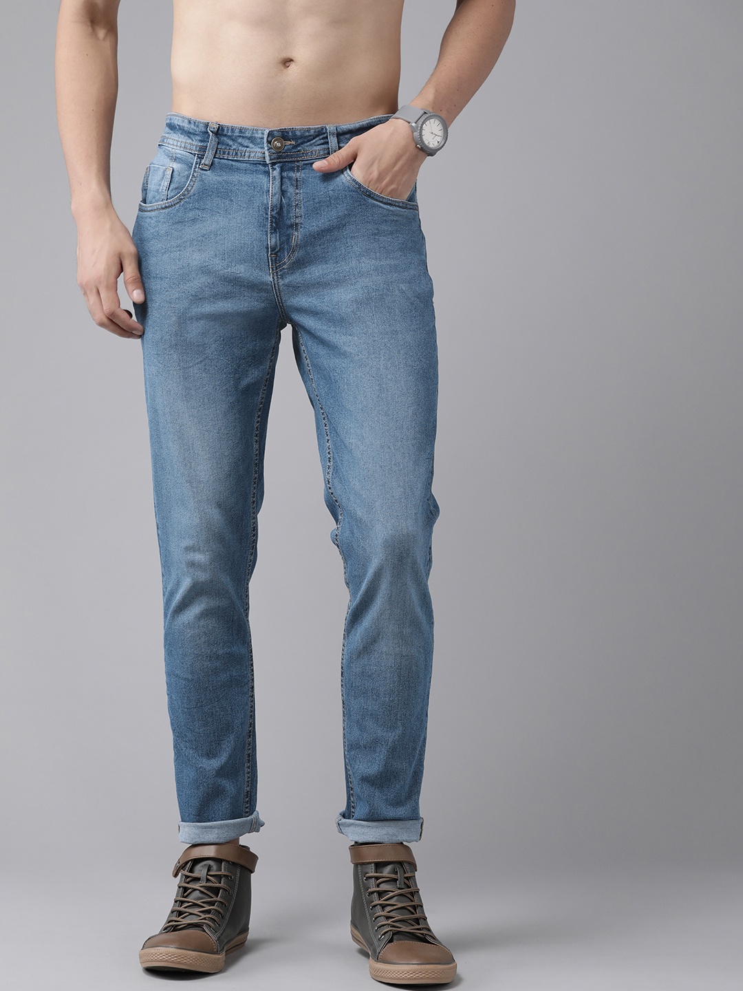 

Roadster Men Blue Solid Tapered Fit Light Fade Stretchable Jeans