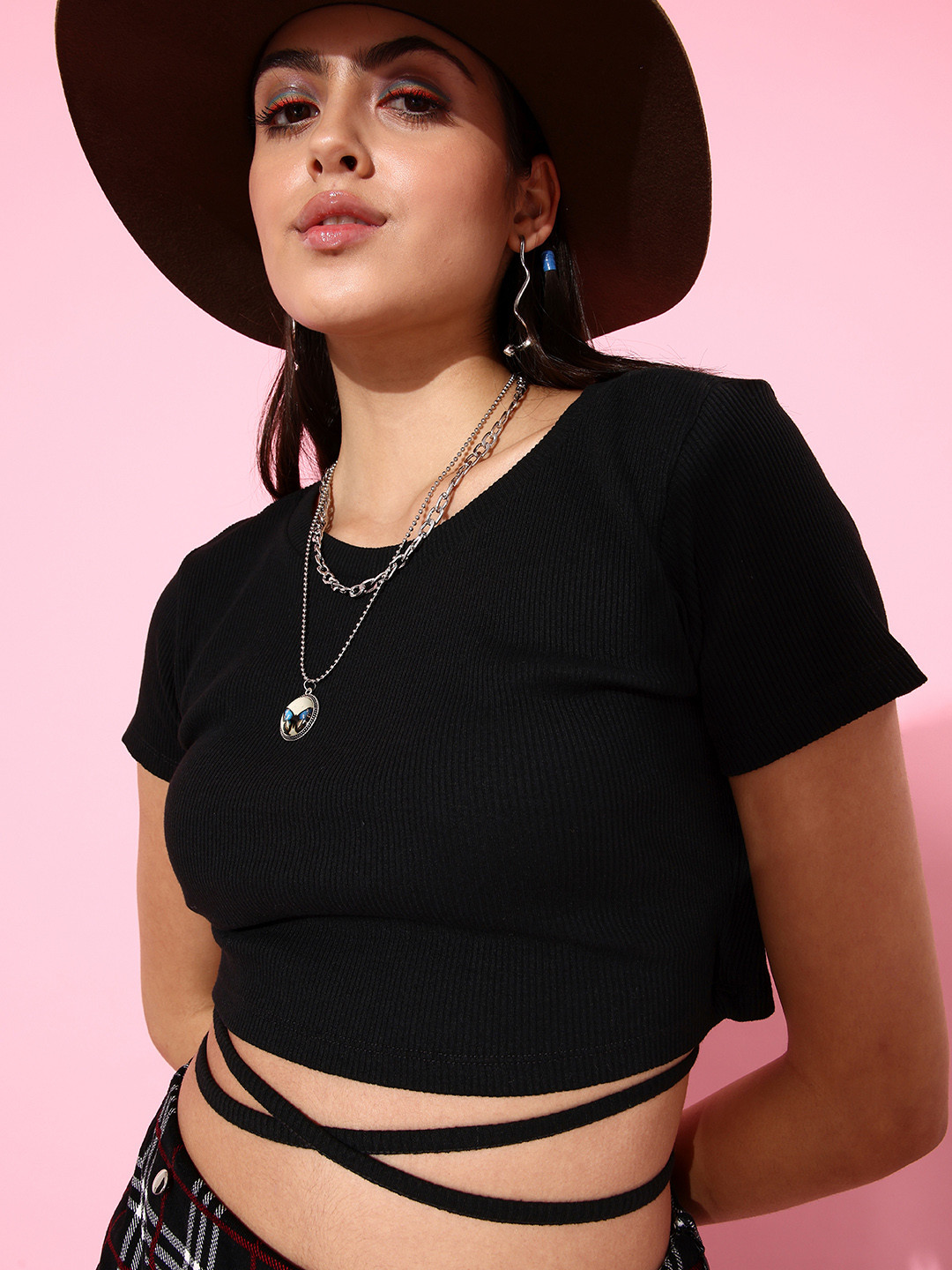 

Moda Rapido Stunning Black Solid Midriff Flossing Top