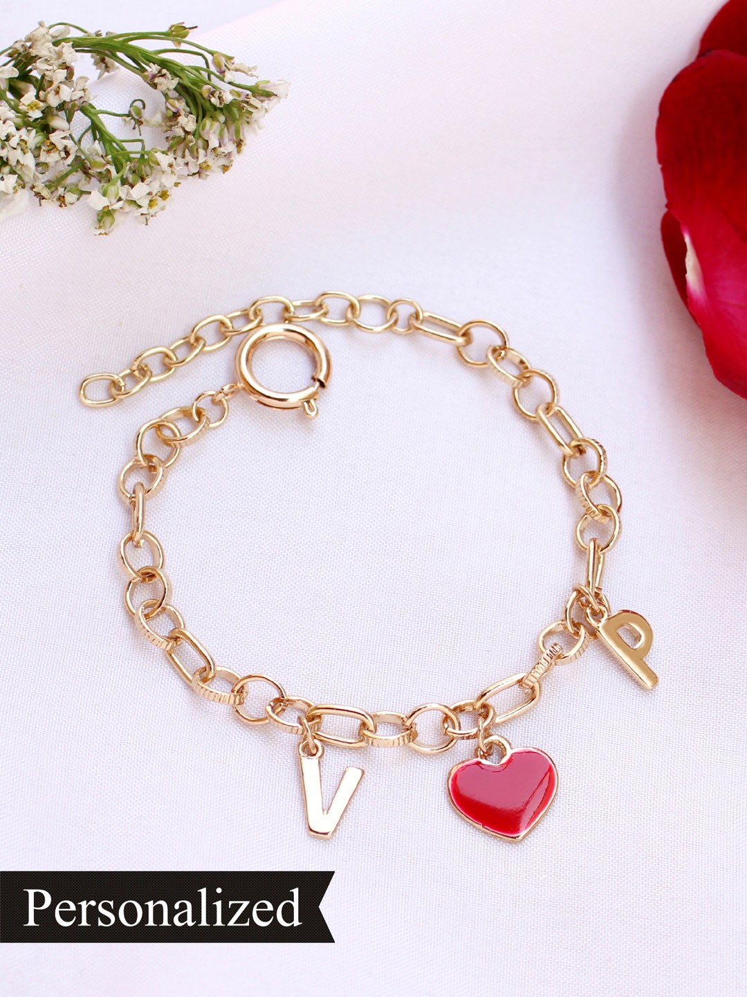 

Runway Ritual Women Gold-Toned Charm Bracelet