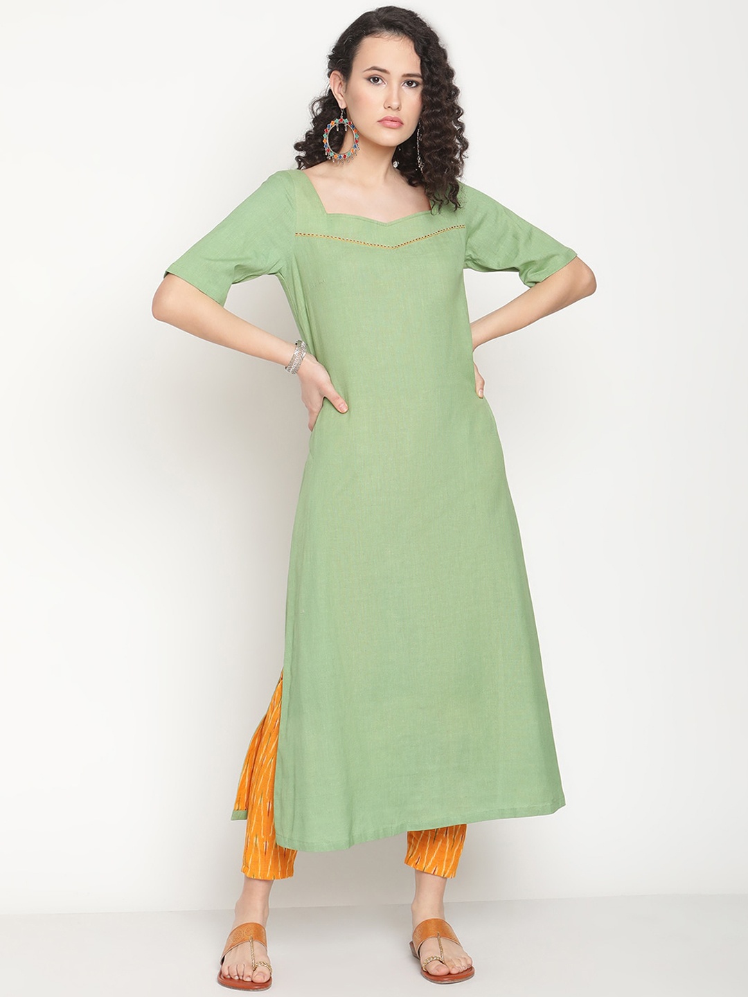

Abhishti Women Green & Yellow Pure Cotton Kurta with Ikat Trousers