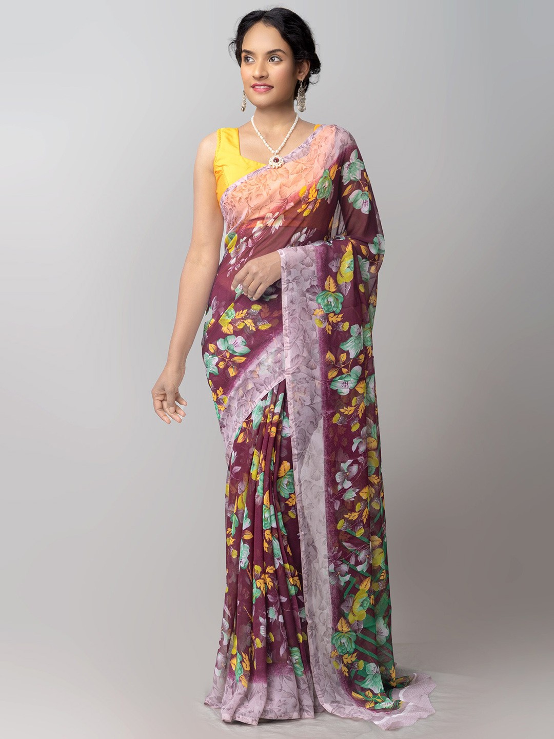 

Unnati Silks Burgundy & Yellow Floral Patola Saree