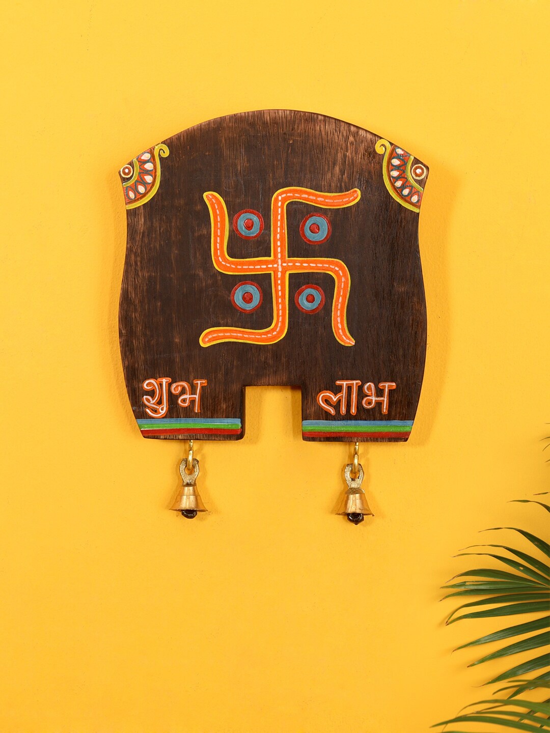 

AAKRITI ART CREATIONS Brown 'Swastika' Hanging Board Wall Decor