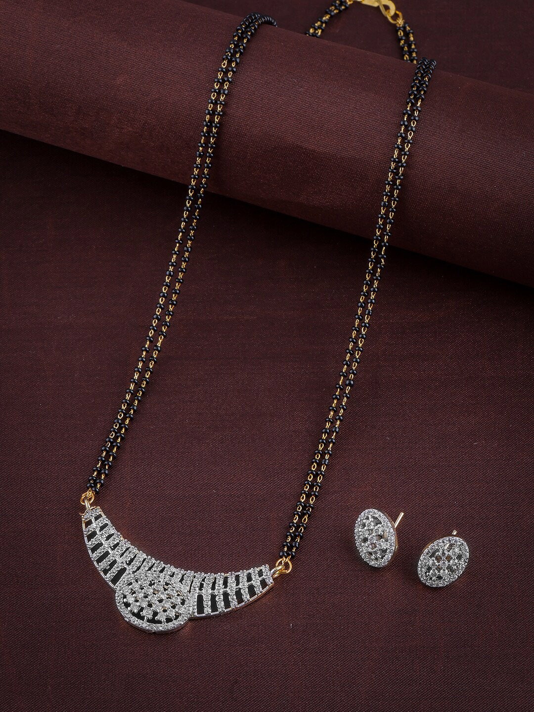 

Brandsoon Gold-Plated Black & White AD-Studded & Beaded Mangalsutra With Earrings