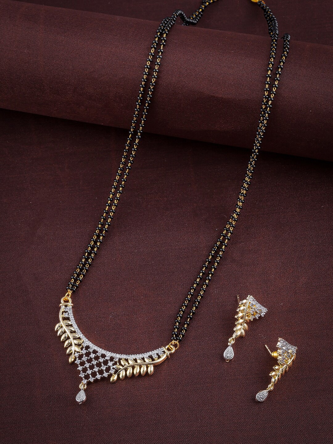

Brandsoon Gold-Plated & White AD-Studded Beaded Mangalsutra With Earrings