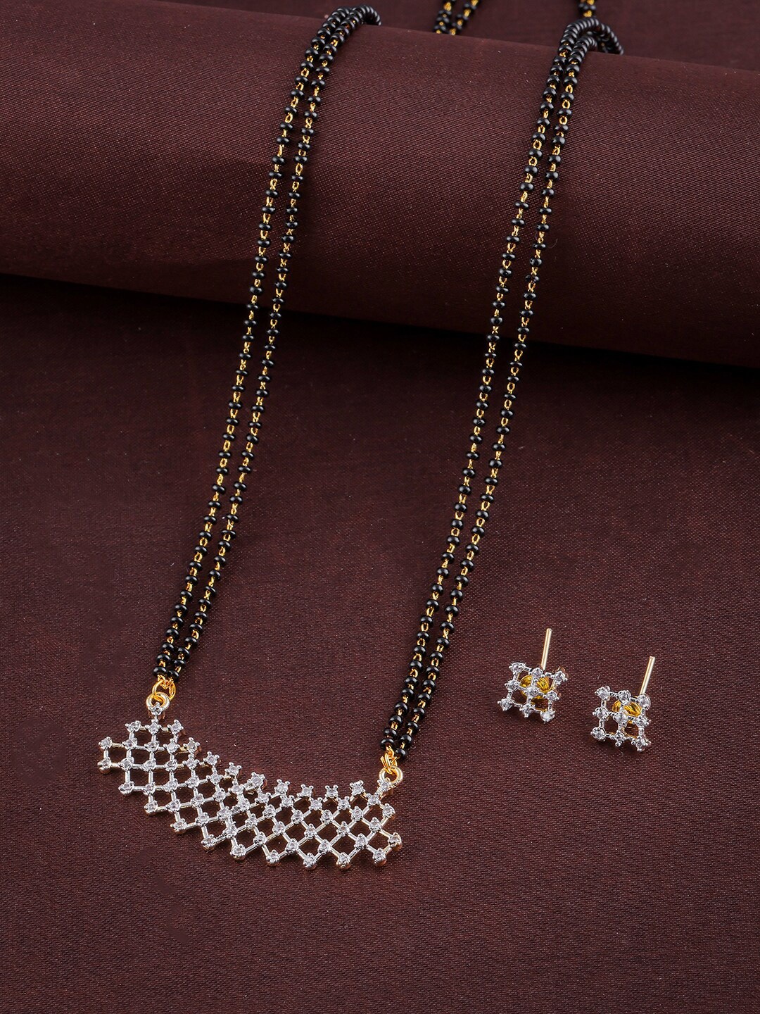 

Brandsoon Gold-Plated Black & White AD-Studded & Beaded Mangalsutra With Earrings