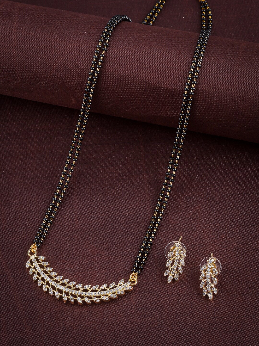 

Brandsoon Gold-Plated Black & White AD-Studded & Beaded Mangalsutra With Earrings