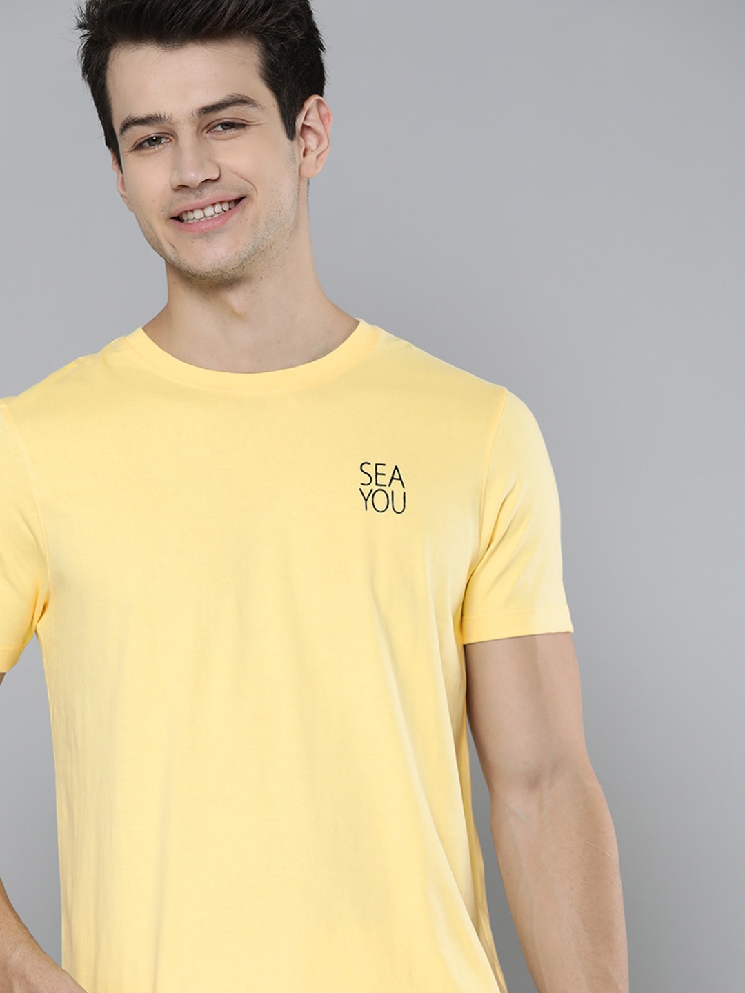 

Mast & Harbour Men Yellow Pure Cotton Solid T-shirt