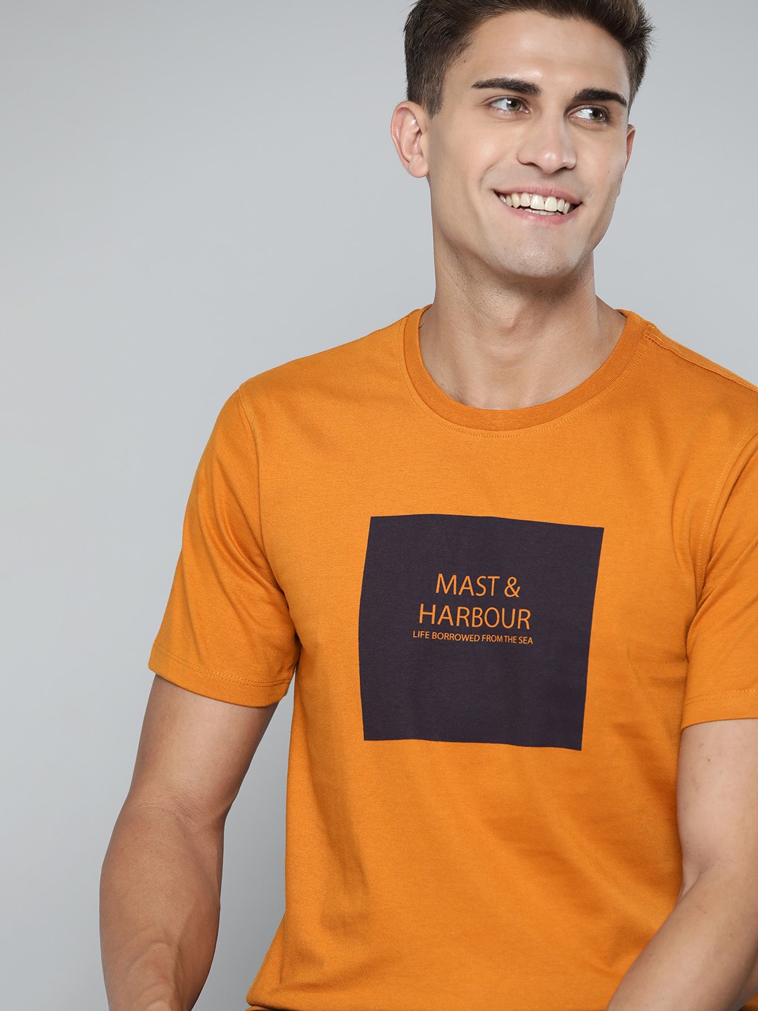 

Mast & Harbour Men Mustard Brown Brand Logo Printed T-shirt