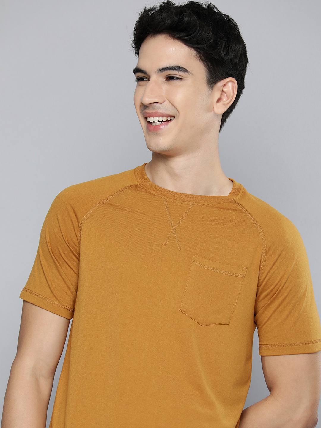 

Mast & Harbour Men Mustard Yellow Solid Raglan Sleeves T-shirt