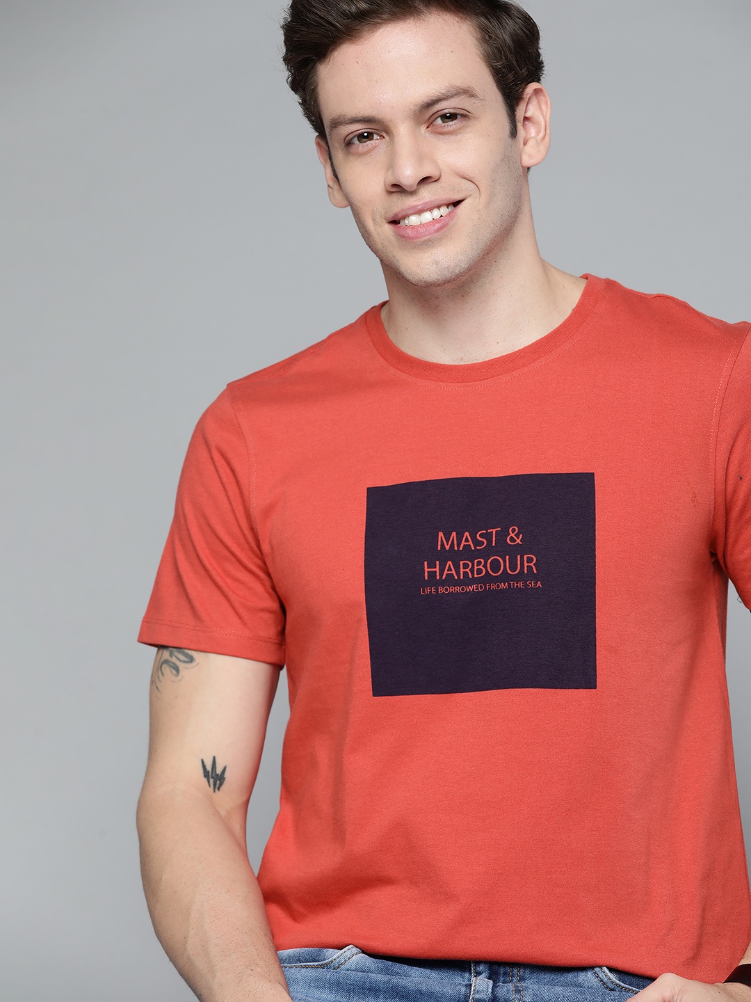 

Mast & Harbour Men Coral Red Typography Printed T-shirt